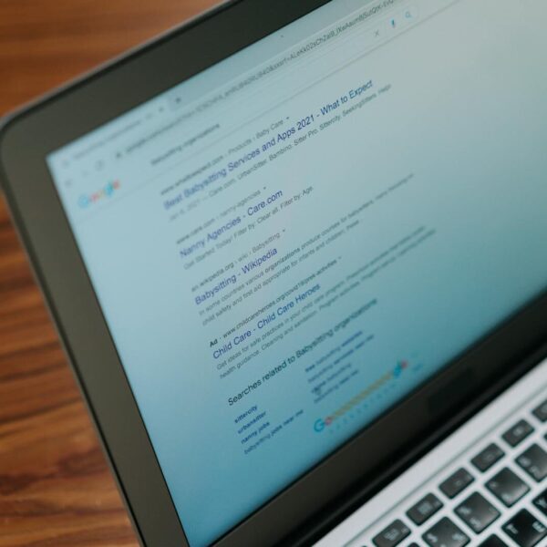 A close up view of a laptop displaying a search engine page