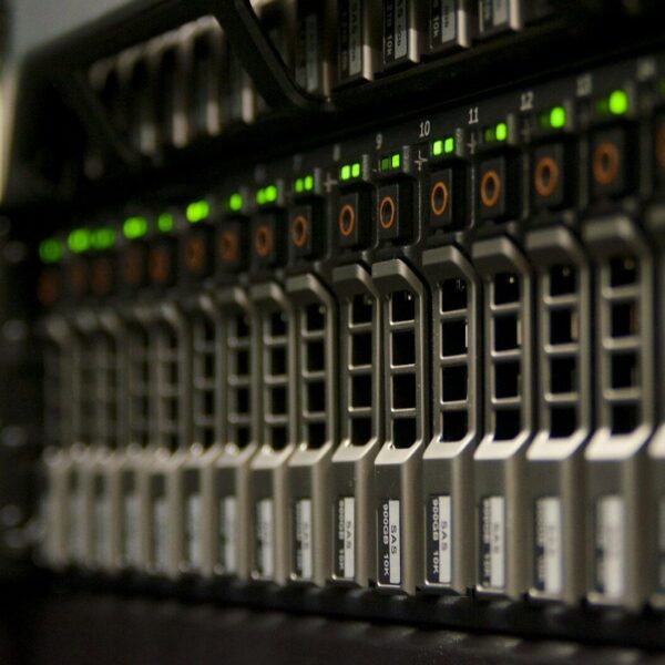 Server rack with blinking green lights